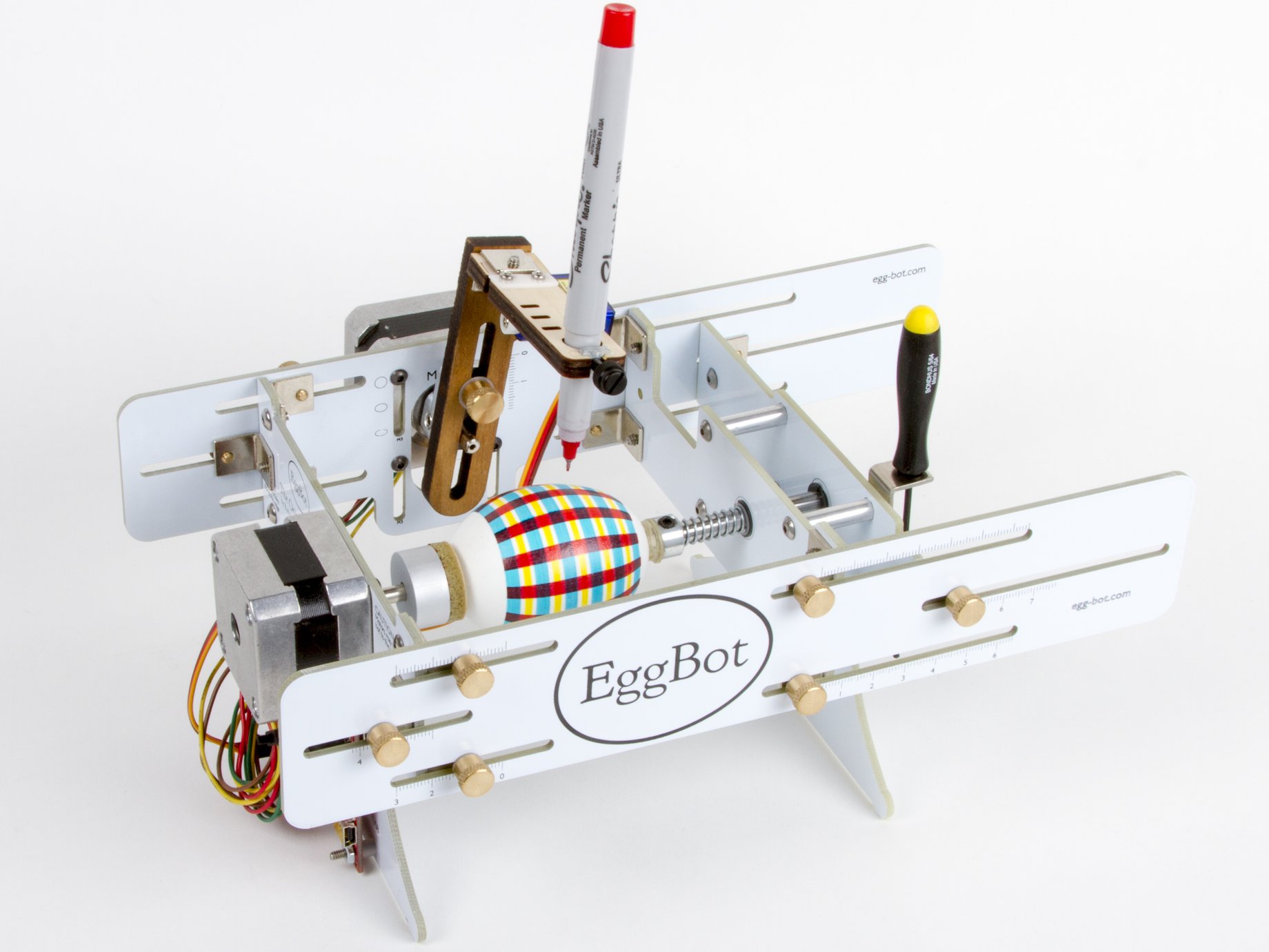 image of egg bot decorating an egg with a plaid pattern